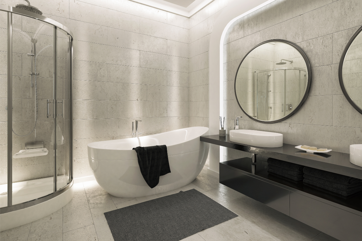 Modernes Badezimmer mit eleganter freistehender Badewanne und stilvoller Beleuchtung – Fachgerecht saniert von der Markus Otte GmbH in Apolda. Dank unserer ganzheitlichen Betreuung erhalten Sie alle Leistungen von Heizung bis Elektro aus einer Hand.